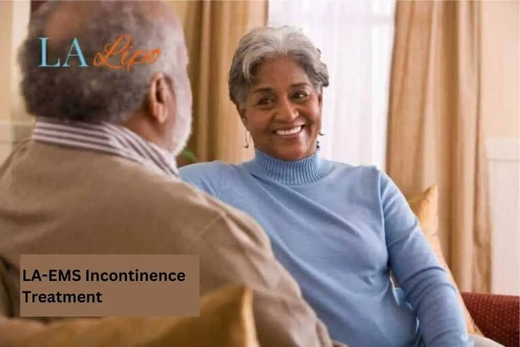 Couple sat smiling at each other - LA-EMS treatment Isle of Dogs